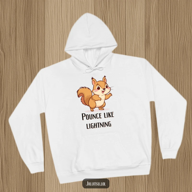 Funny Energetic Squirrel Judo Hoodie: A lively squirrel in a judo gi playfully charges forward, offering warmth and energetic humor.